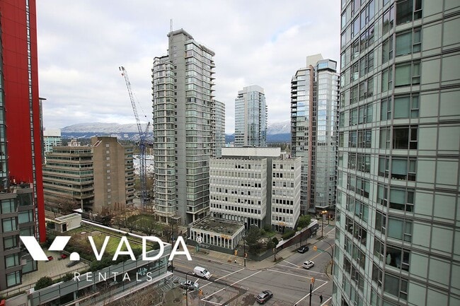 Photo du bâtiment - The Melville Coal Harbour 2 Bedroom Apartm...