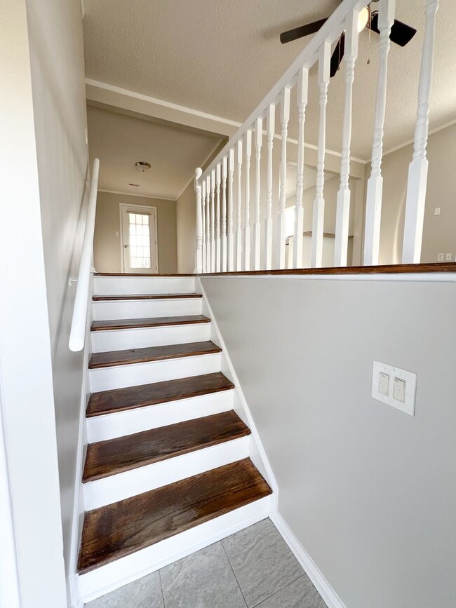 Building Photo - Split Foyer with a Fenced Backyard and a S...