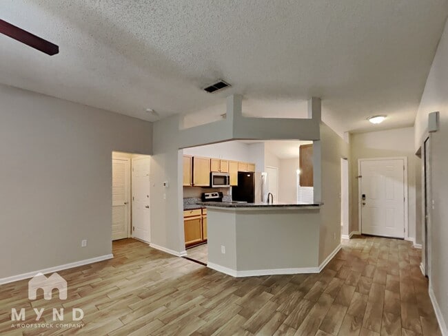 Building Photo - 7637 Invermere Blvd N