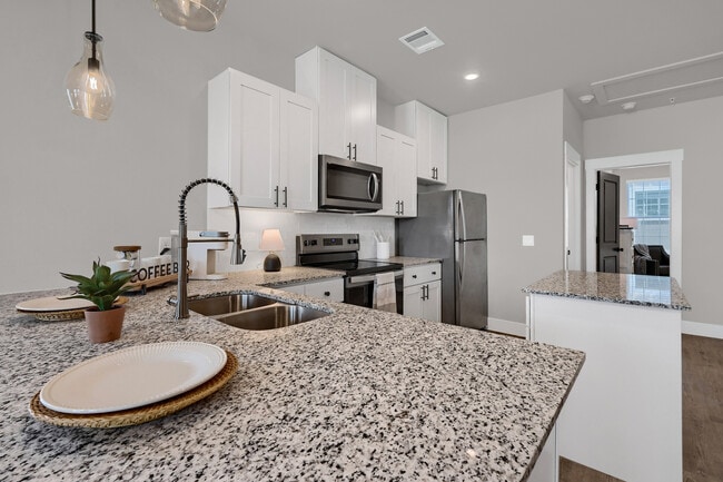 Bar View into Kitchen - Heritage Court Luxury Townhomes