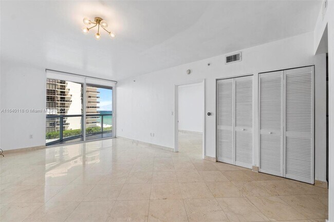 Building Photo - 6365 Collins Ave