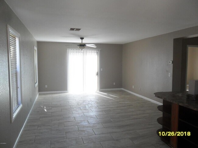 Building Photo - El Mirage Home with Tile Flooring Throughout