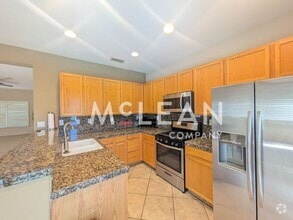 Building Photo - 1669 E Racquet Club Rd