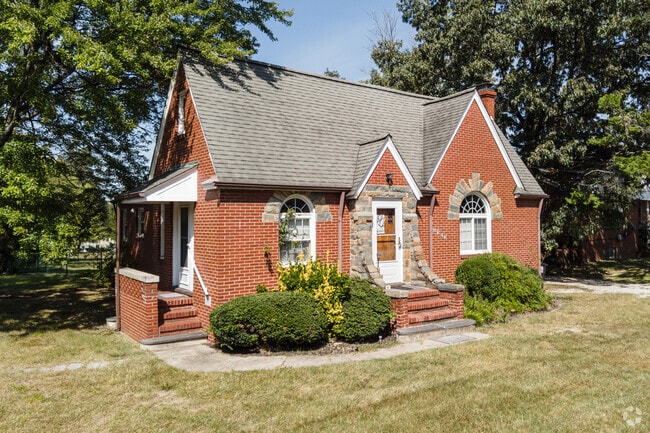 Forestville features brick Minimal Traditional homes with Tudor-style details.