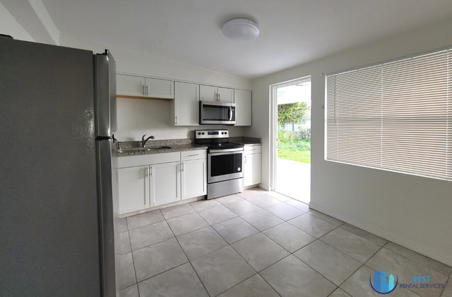 Building Photo - COMING SOON! 2/1 House W/ Modern Upgrades ...