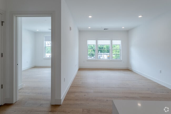1BR, 1BA + Den - 864SF - Living Room - The 545