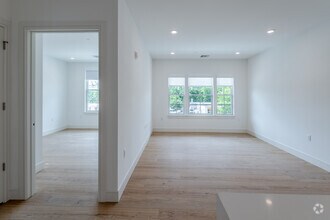 1BR, 1BA + Den - 864SF - Living Room - The 545