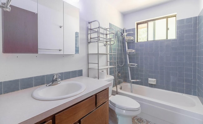 Building Photo - Three bedroom two bath home in a quiet nei...