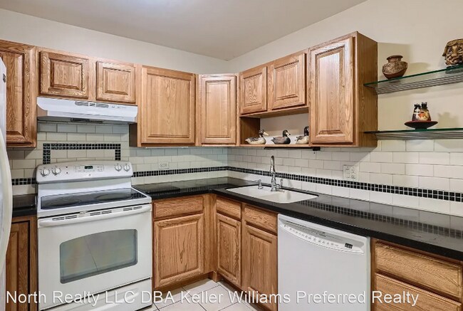 Building Photo - 2 br, 2 bath House - 9625 E. Center Ave. 11D