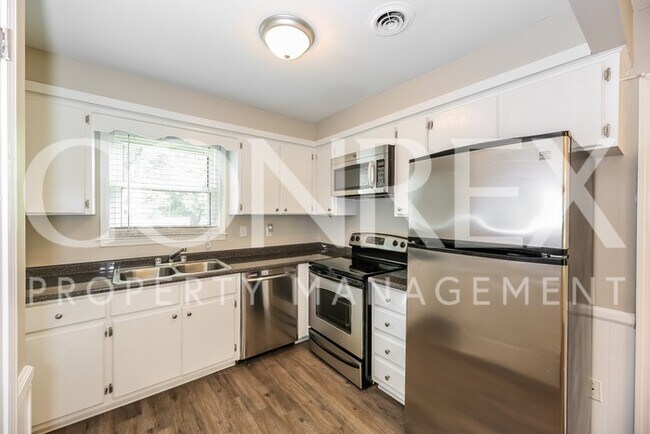 Building Photo - Charming Three Bedroom Home Now Available