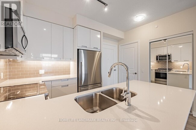 Building Photo - 35-1235 Watergarden Dr