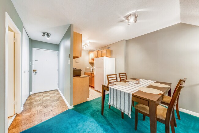 Dining table and chairs included - 2201 L St NW