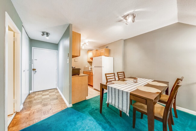 Dining table and chairs included - 2201 L St NW