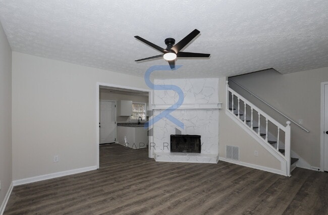 Building Photo - Move in before January 15th and choose your reward: a $250 Amazon Gift Card or a 55" Smart TV!