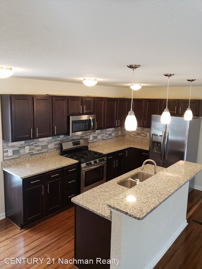 Building Photo - 3 br, 3.5 bath House - 5801 Miss Coral Court