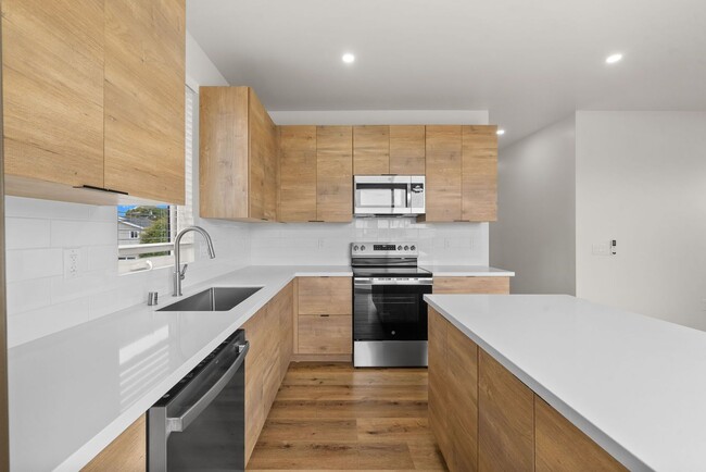 Building Photo - Introducing a stunning newly constructed t...