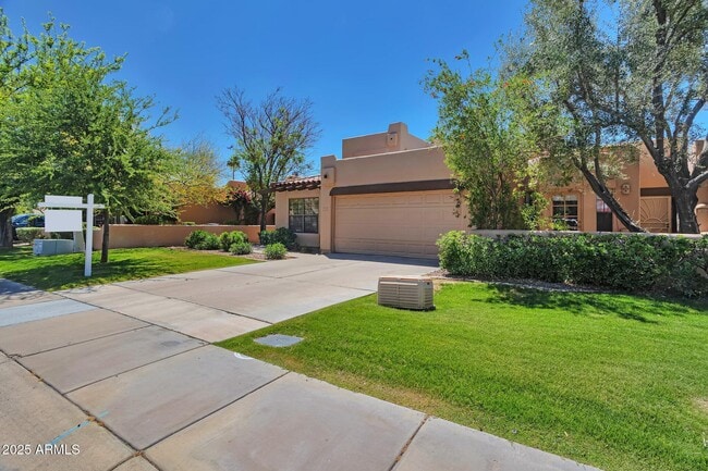 Building Photo - 7809 E Montebello Ave