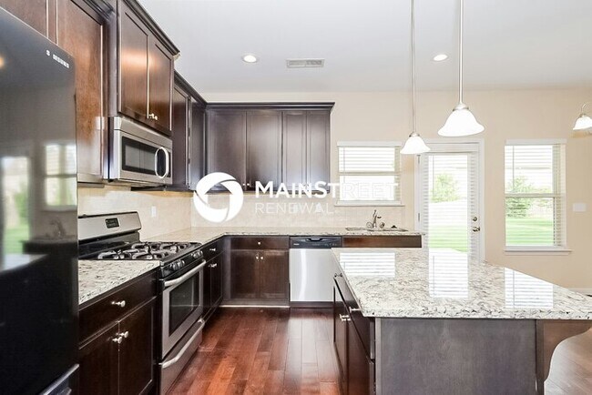 Building Photo - 5 Bedroom Pet-Friendly Home in Locust Grove, GA with Main Street Renewal
