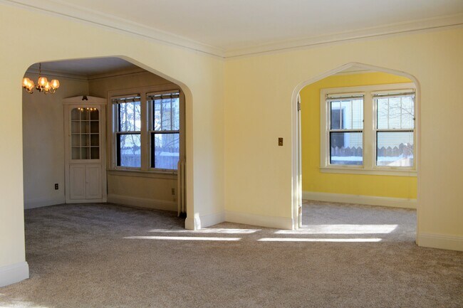 Living Room w/ adjoining Sun Room and Formal Dining Room - 969 Saint Clair Ave