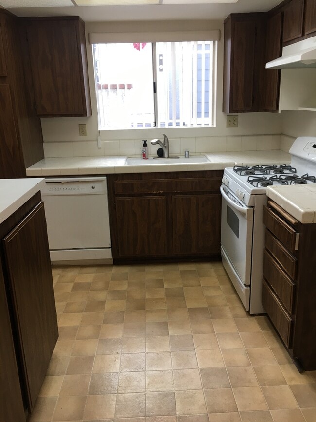 Kitchen from dining area - 505 E Providencia Ave