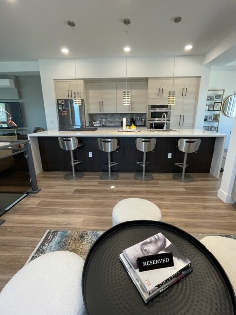 Looking into kitchen from sitting area - 7788 E Main St