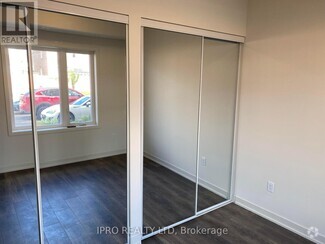 Building Photo - 103-162 SKY HARBOUR Dr