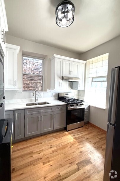 Building Photo - 6044 S Rhodes Ave