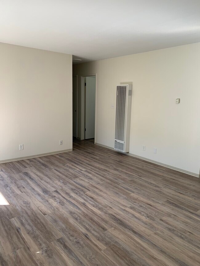 Living room view going down hallway - 6531 Manila Ave