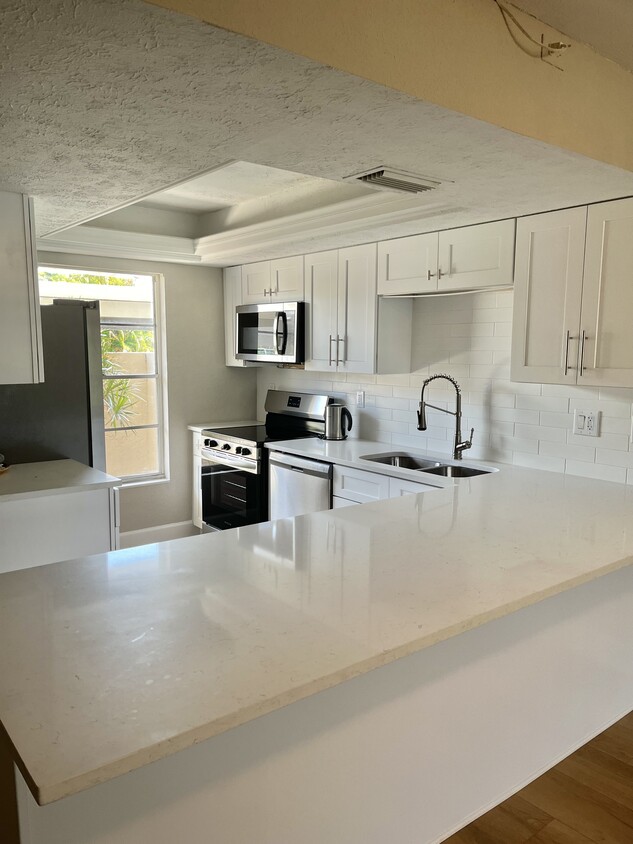 Kitchen With Quartz Countertop - 16251 Dublin Cir