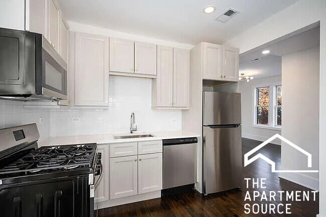 Photo - 3749 W School St Apartment