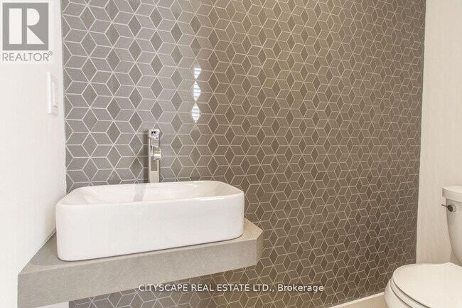 Photo du bâtiment - 98 Manning Ave