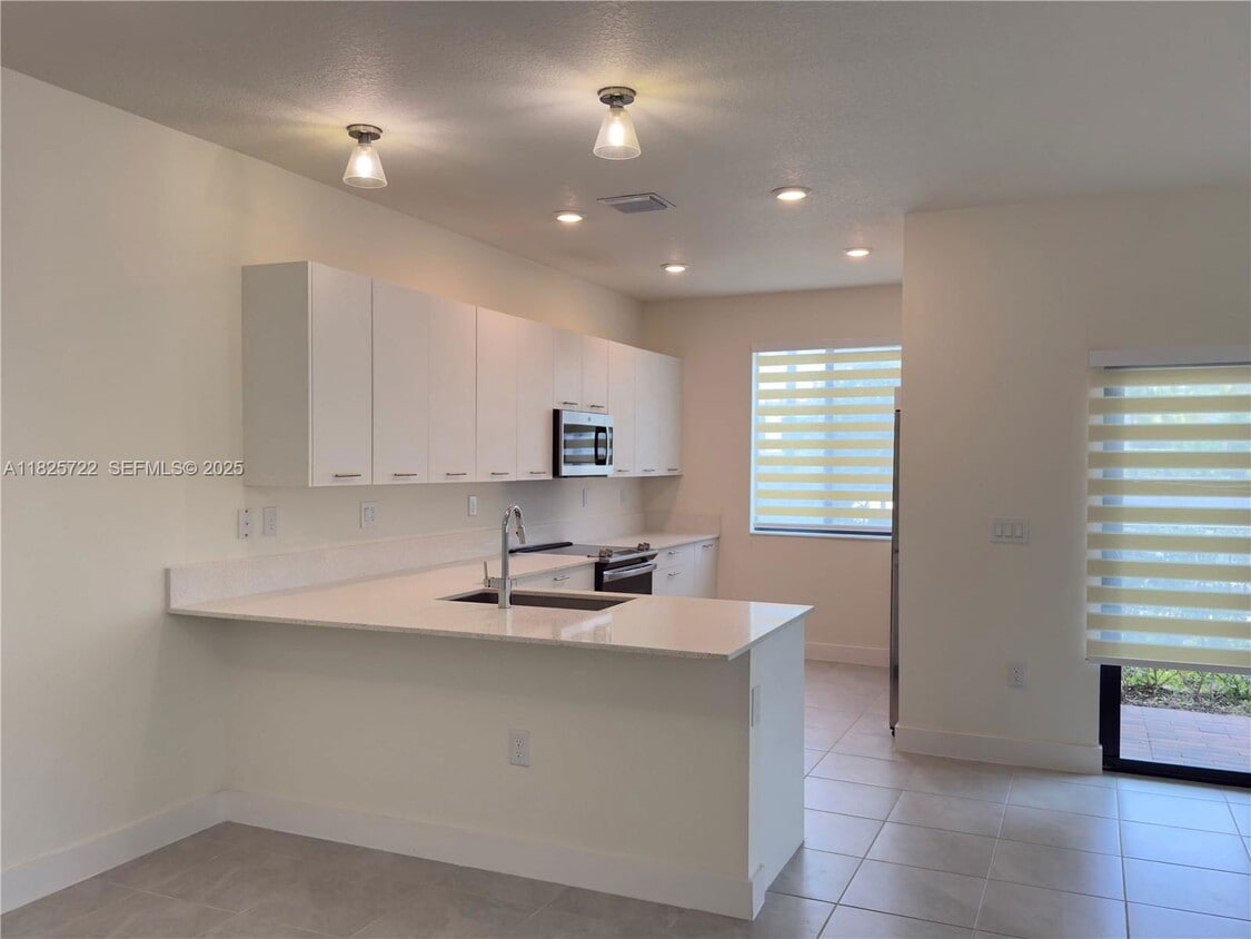 Photo - 8317 Northwest 45th Street, Doral, FL 33166 - 3 BR 3.5 BA villa