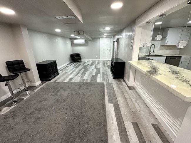 Building Photo - 1st Rent Month Free!! Stunning Partially F...