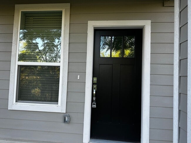 Building Photo - For Lease – Modern 2023 Condo Backing to Greenbelt | Creekside at Pioneer Crossing West