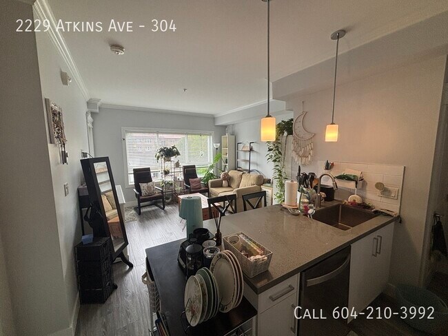 Photo du bâtiment - Cozy Condo in the Heart of Port Coquitlam