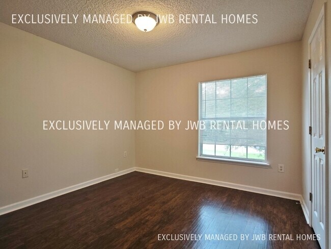 Building Photo - 8432 McGirts Village Ln