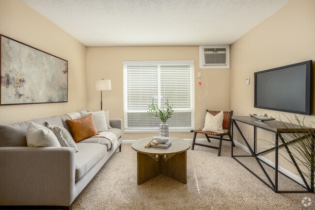 2BR, 1BA - 850SF - Living Room - River's Edge Apartments