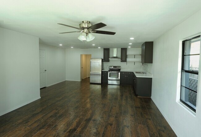 Open concept living room and kitchen area - 1045 Washington Ave