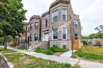 Building Photo - 6433 S Vernon Ave