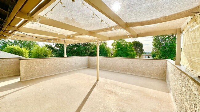 Building Photo - Beautifully Remodeled Upstairs Condo Unit ...