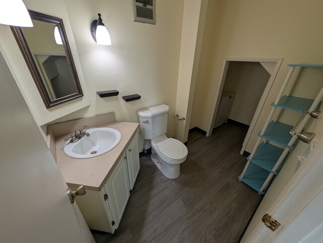 Downstairs powder room - 934 SW Caldew Dr