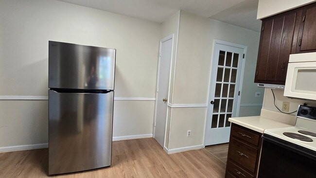 Kitchen fridge, and dining room storage closet - 790 Vine St