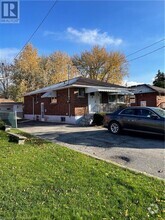 Building Photo - 102 Fernwood Crescent