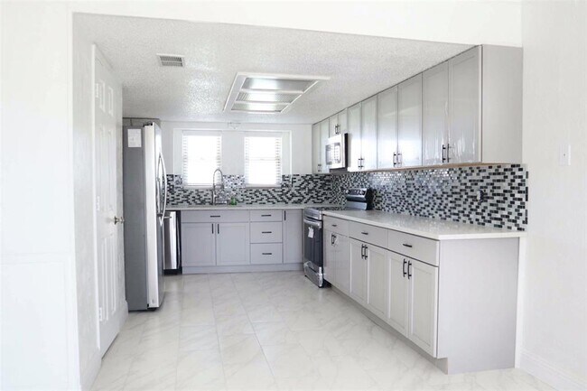 Foto del edificio - 8614 Merritt Rd