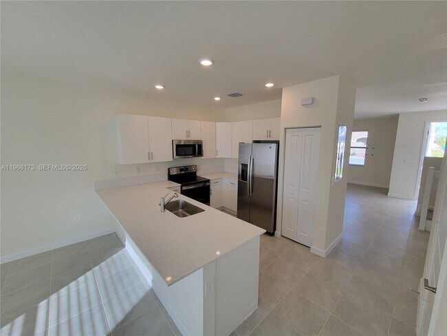 Building Photo - 11404 West 33rd Ct