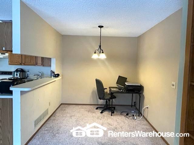 Building Photo - 7584 Vinewood Ct N