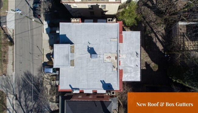New Roof & Box Gutters - 2412-2414 Salutaris Ave