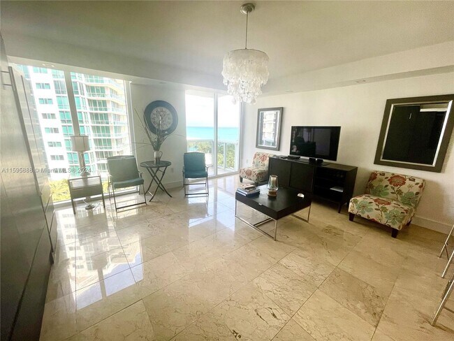 Building Photo - 10275 Collins Ave