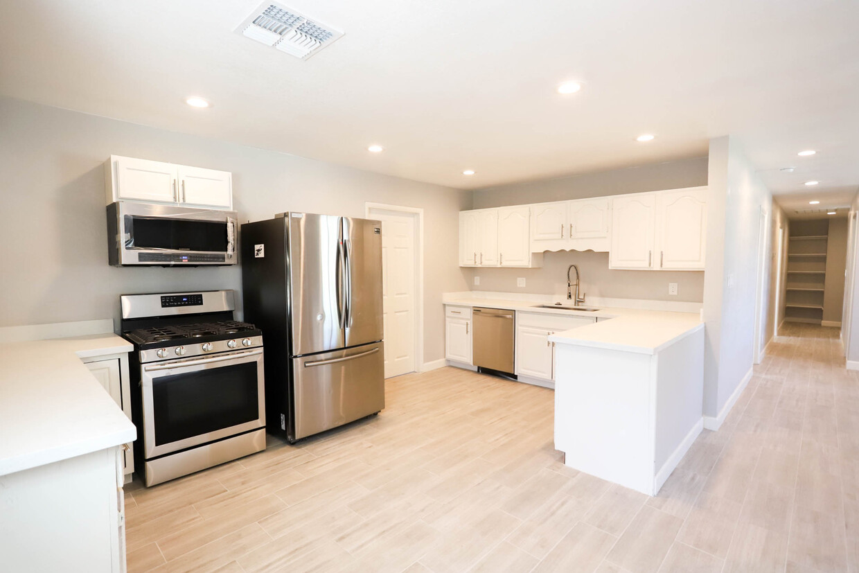 Bright kitchen offers stainless steel appliances! - 12224 N 23rd St