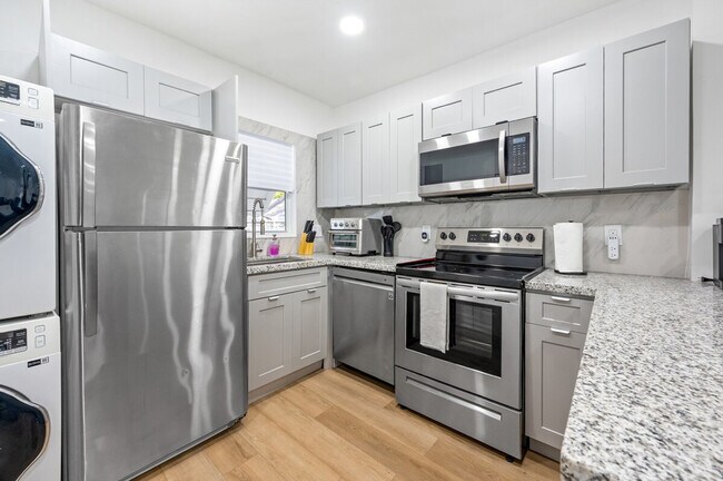 Building Photo - 310 NE 58th Terrace